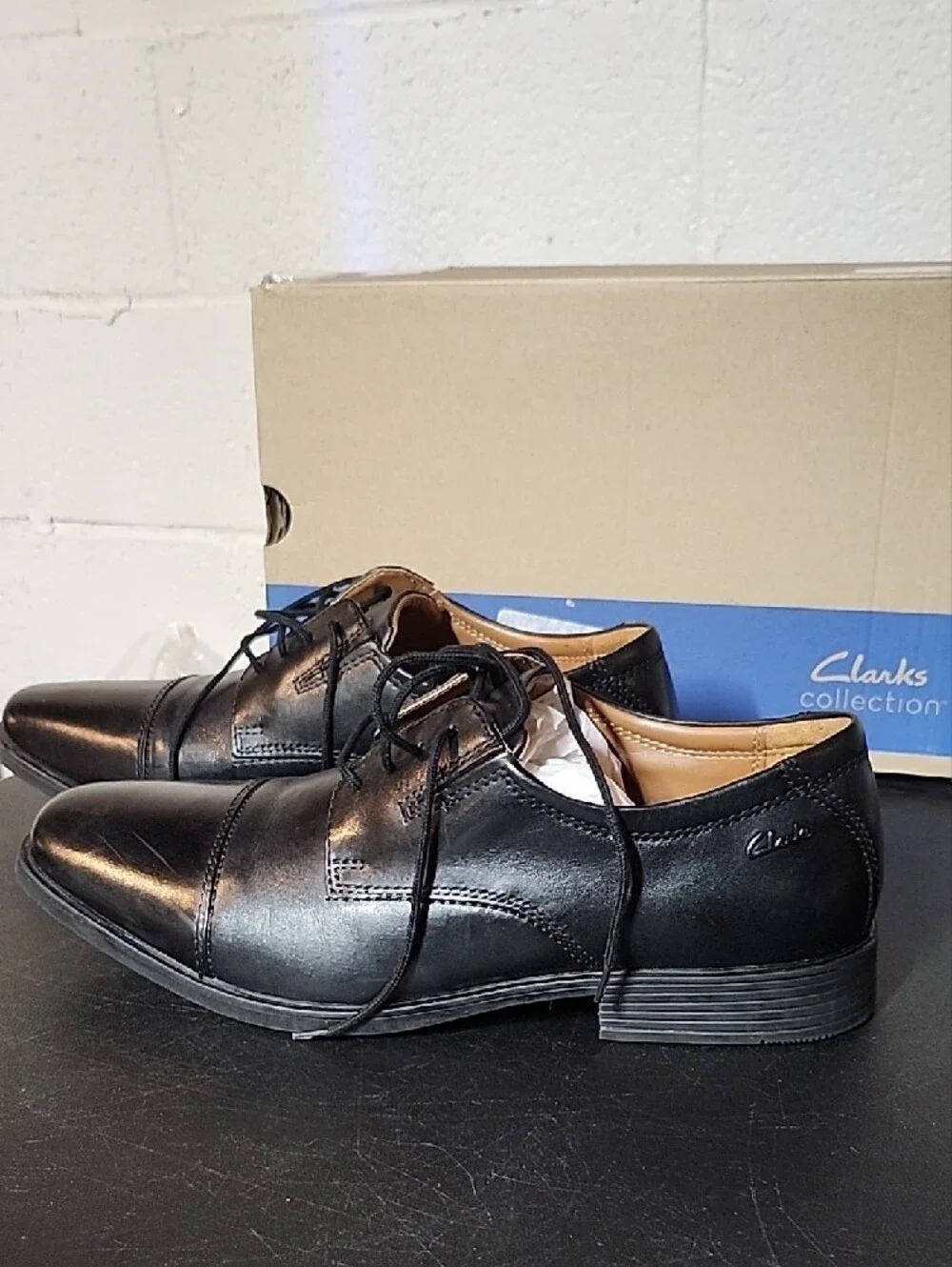 Clarks polished black